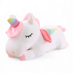 Licorne en peluche couchée pour enfant